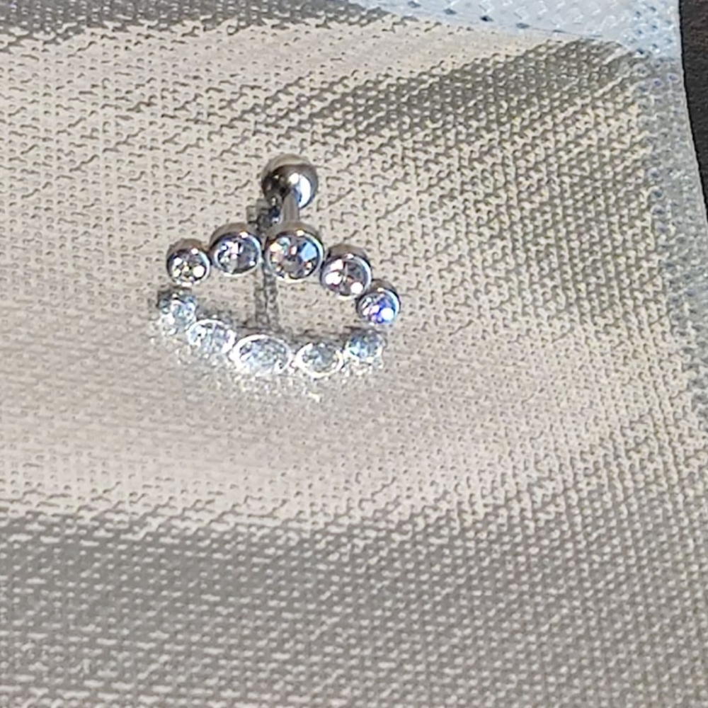 White cartilage ear piercing